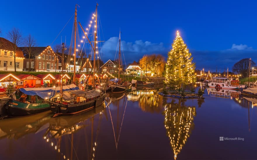 Floating Christmas tree in the museum harbor Carolinensiel, Lower Saxony