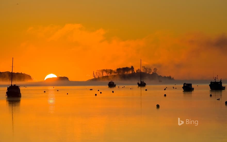 Silhouettes of fishing boats in Mahone Bay, Nova Scotia, Canada