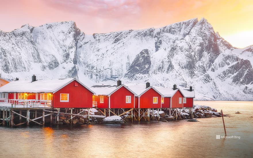 Traditional red fishermen's cabins on the shore of Reinefjorden, Norway