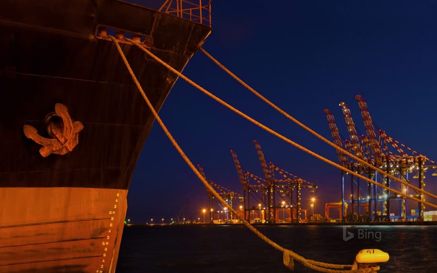 A ship docked at night in the Port of Cape Town, South Africa